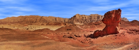 Panorama of famous mushroom shape geological formation and Arava mountains on background in Timna national park, Israel の写真素材