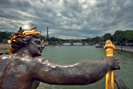 View of Seine River and Eiffel Tower from famous Alexander the III bridge in Paris, France の写真素材
