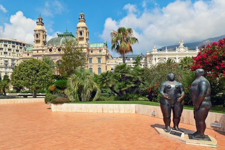 MONTE CARLO, MONACO - JULY 13, 2013  Adam and Eve sculpture by Fernando Botero in 1981, situated in gardens near Salle Garnie - gambling and entertainment complex designed by architect Charles Garnier and opened in 1879 のeditorial素材