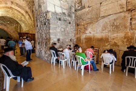 JERUSALEM, ISRAEL - AUGUST 21, 2013  Prayers inside the Cave Synagogue which is a part of Western Wall  aka Wailing Wall  - Judaismのeditorial素材