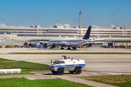 Police security vehicle patrols outdoor perimeter of Munich International Airport のeditorial素材