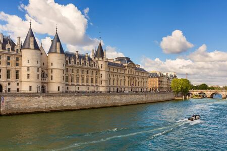 View of Conciergerie - former prison and part of former royal palace on the bank of Seine river in Paris, France.の写真素材