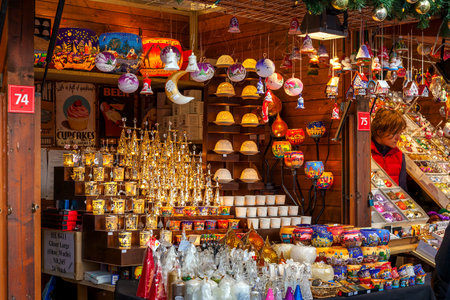 PRAGUE, CZECH REPUBLIC - DECEMBER 11, 2016: Wooden stall with decorations for winter holidays at traditional annual Christmas market in Old Town of Prague.のeditorial素材