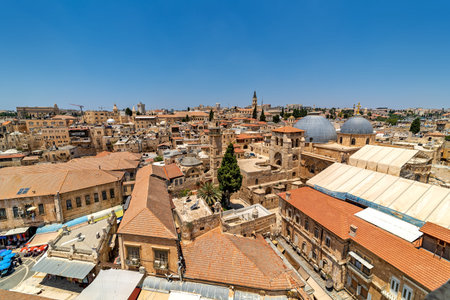 View from above of red roofs, houses, minarets and churches in old city of Jerusalem, Israel.