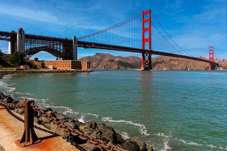 View of the bay and famous Golden Gate Bridge under blue sky in San Francisco, California, USA.の写真素材