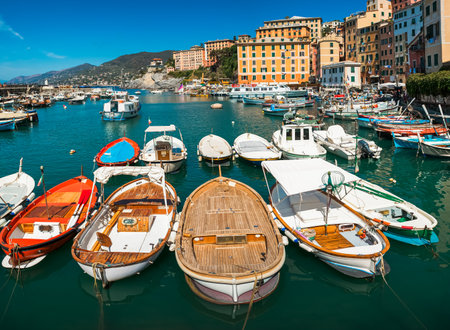 Boats and colorful buildings in the port of Camogli - small town in Liguria, Italy.の写真素材