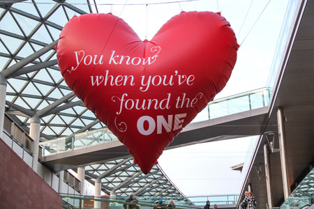 Heart Shaped Balloon hanging in the airの写真素材
