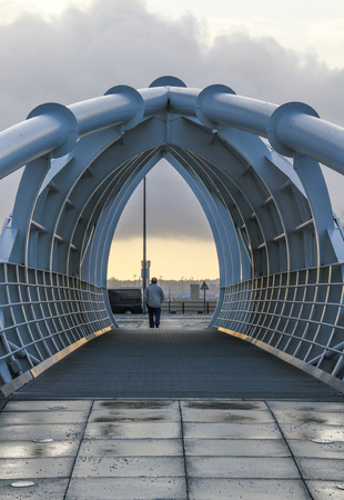 Man at the end of Bridge over the Princess Dock, Merseysideのeditorial素材