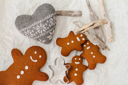 Gingerbread man cookies on the decorated tableの写真素材