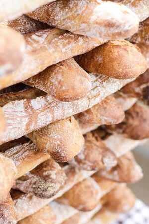 Freshly baked bread for sale on street marketの写真素材