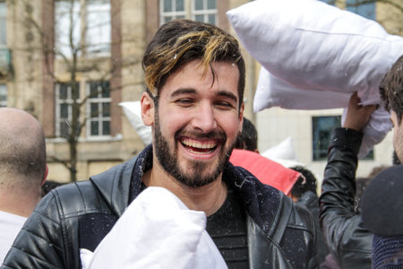 Happy guy at pillow flight event in Amsterdamのeditorial素材