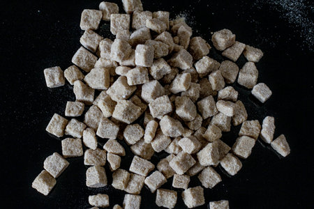 Brown sugar is a sucrose sugar product with a distinctive brown color due to the presence of molassesの写真素材