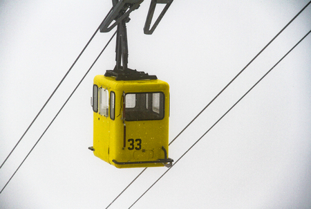 Black cable cart lift with the wiresの写真素材