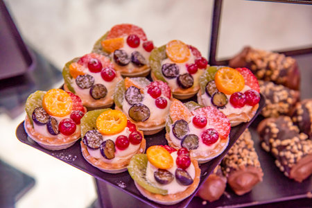 variety of cupcakes on a brown plate