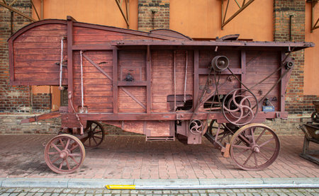 Old agricultural threshing machineの写真素材