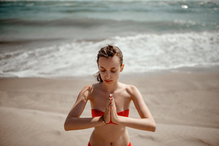 beautifull girl in underwea on the beach maditation