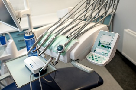 Dental chair with equipment in the dental officeの写真素材
