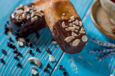 Sweet cookies with seasonings on blue wooden tableの写真素材