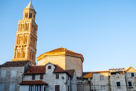 Ancient buildings and bell tower of cathedral in Split city center at the sunny evening in Croatiaの写真素材