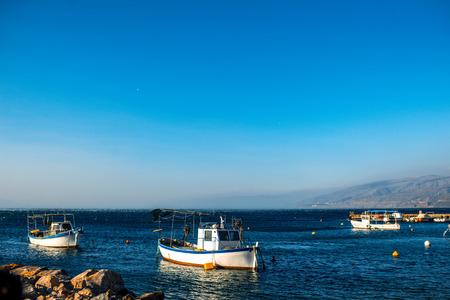 Fishing boats floating near the Senj city in Croatiaの写真素材
