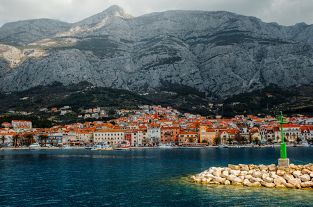 Makarska city. View from the sea with light house on foregroundの写真素材