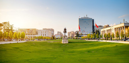 Skanderbeg square with flag, Skanderbeg monument and national museum in the center of Tirana city, Albania. General plan, panorama view.のeditorial素材