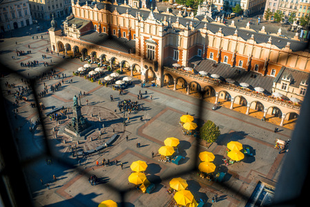 Krakow, POLAND - OCT 09, 2015: People walking on the main market square near Cloth Hall in Krakow on the morning. Aerial view from St. Mary's Basilica towerのeditorial素材