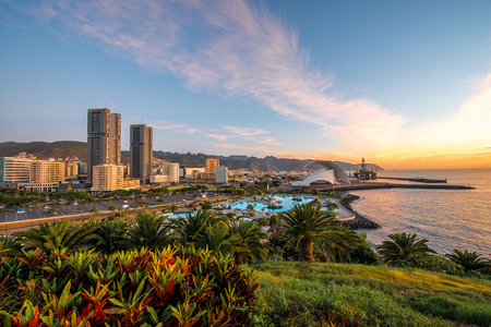 Santa Cruz cityscape view with park, ocean and mountains on the background on the sunrise, Canary islands, Spainの写真素材