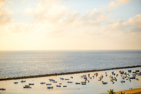 Fishing boats on Teresitas beach on the sunrise on Tenerife island, Spainの写真素材