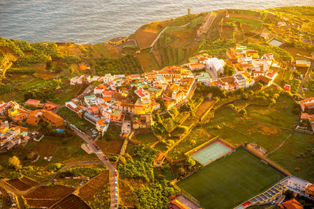 Top view from Mirador de Abrante on Agulo coastal village on La Gomera island on the sunrise in...