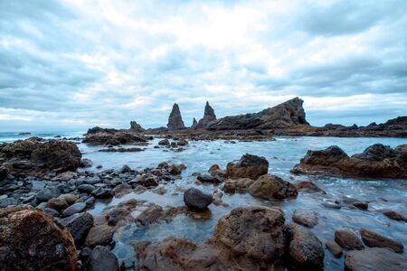 Stone coast with sharp cliffs on the western part of La Gomera island in Spainの写真素材