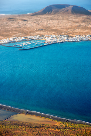 Top view on Graciosa island from El Rio viewpoint on Lanzarote island in Spainの写真素材