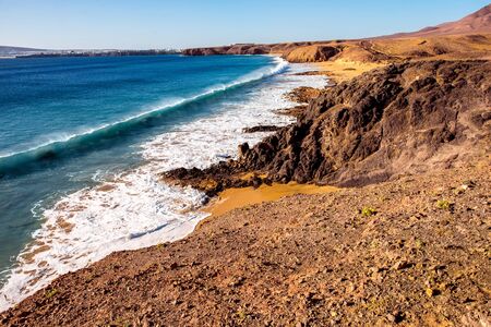 Papagayo beach near Las Coloradas resort on the south of Lanzarote island in Spainの写真素材