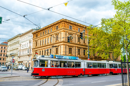 VIENNA, AUSTRIA - CIRCA APRIL 2016: Old red tram on the street in Vienna. Four wheel tram of Type L are still popular public transportation in Austriaのeditorial素材