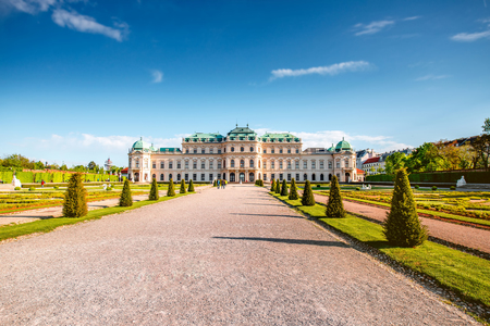 VIENNA, AUSTRIA - CIRCA APRIL 2016: Upper Belvedere palace with tourists walk on the alley. This Baroque palace complex was built as a summer residence for Prince Eugene of Savoy.のeditorial素材
