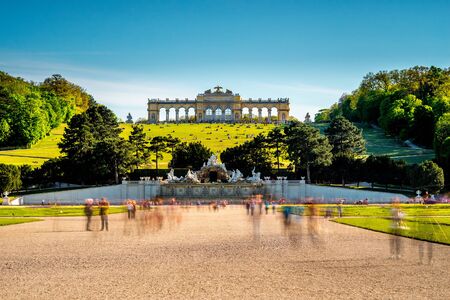 VIENNA, AUSTRIA - CIRCA APRIL 2016: Gloriette building in Schonbrunn gardens. This Palace is one of the most important historical monuments in Austria. Long exposure technic with blurred peopleのeditorial素材