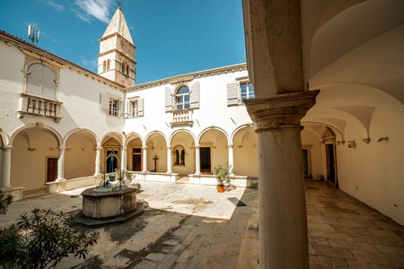 Courtyard of Minorite monastery of St. Francis in Piran city in Sloveniaの写真素材