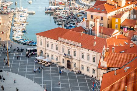 Piran, Slovenia - May 7, 2016: Top view on Tartini square with town hall building in Piran town. Piran is one of Slovenia's major tourist attractions.のeditorial素材