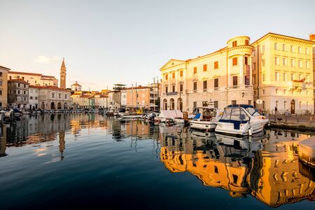 Piran, Slovenia - May 8, 2016: Piran old town center with church tower and marina at the morning. Piran is one of Slovenia's major tourist attractions.のeditorial素材