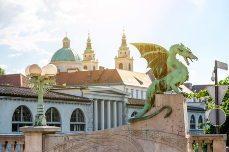 Dragon statue on the bridge in Ljubljana city in Slovenia. This statue is the main symbol of slovenians capital.の写真素材