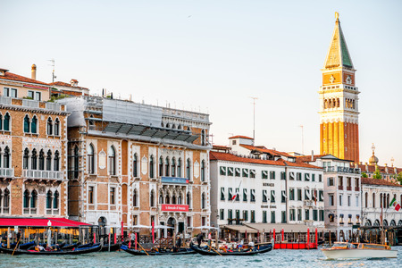 Venice, Italy - May 18, 2016: Sunset view on San Marco campanille with gothic buildings on Grand canal in Veniceのeditorial素材