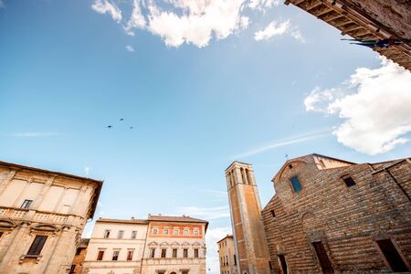 Cityscape view on Santa Maria Assunta cathedral on the main square in Montepulciano town in Italyの写真素材