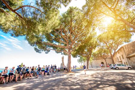Cannes, France - June 14, 2016: Tourists near Castre museum on the squre with cityscape view on Cannes city on the french rivieraのeditorial素材