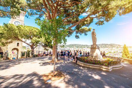 Cannes, France - June 14, 2016: Tourists near Castre museum on the squre with cityscape view on Cannes city on the french rivieraのeditorial素材