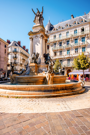 Grenoble, France - June 21, 2016: City street view with fountain of Three Orders in the old town of Grenoble city on the soth-east of Franceのeditorial素材