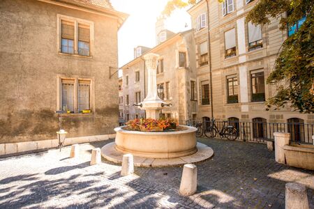 Small fountain in the old town of Geneva city in Switzerlandの写真素材