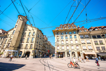 Bern, Switzerland - June 24, 2016: Street view with people in the old town of Bern city in...