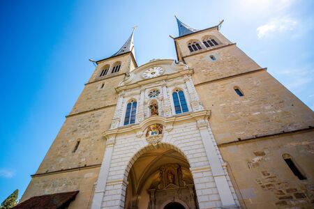 Facade of the catholic Hof church in the old town of Lucerne city in Switzerlandの写真素材