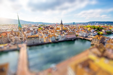 Aerial panoramic cityscape view on the old town of Zurich city in Switzerland. Image with tilt-shift effectの写真素材