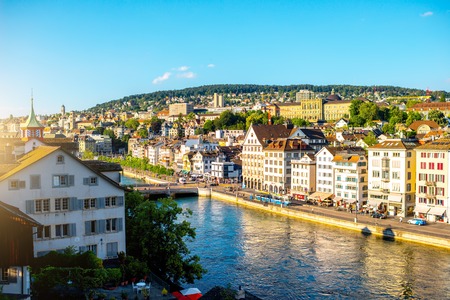 Zurich, Switzerland - June 28, 2016: Cityscape view from Linden park on the riverside with beautiful buildings in Zurich old town in Switzerlandのeditorial素材